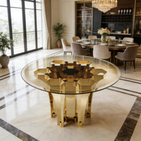 Table à manger ronde moderne en verre trempé avec base sculpturale dorée pour la maison et l'hôtel