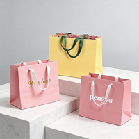 Sac cadeau en papier artistique personnalisé avec une variété de matériaux de poignée pour l'emballage de bijoux et de montres, vente en gros, haute qualité, écologique