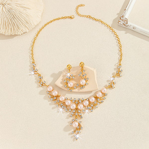 Juego de joyería de imitación de perlas y diamantes de alta gama para cumpleaños, novia, boda, collar y aretes, dos piezas, venta directa de fábrica - Product Image 4
