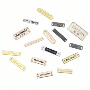 ป้ายติดเสื้อผ้ารูปวงกลมแบบเป็นมิตรกับสิ่งแวดล้อม พร้อมพวงกุญแจสำหรับกระเป๋าเสื้อผ้า ป้ายชุบโลหะแบบกำหนดเองได้ - Product Image 2