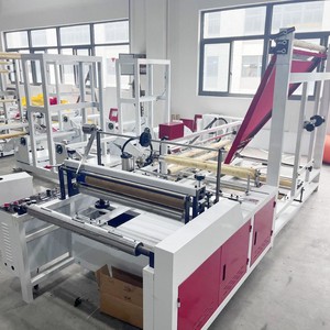 เครื่องทำถุงหงตง 1200 เครื่องพับฟิล์ม BOPP สำหรับถุงเสื้อผ้าแบบปากแบนพร้อมกาวในตัว - Product Image 1
