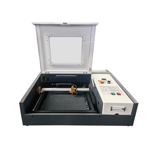 उच्च परिशुद्धता 320 440 <span class=keywords><strong>Co2</strong></span> लेजर उत्कीर्णन और काटने के लिए काटने और काटने की मशीन - Product Image 4