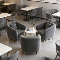 Fauteuil de salle à manger individuel en cuir, style minimaliste de luxe, pour restaurant commercial, avec table en pierre frittée pour restaurant buffet