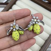 Leuke fruitgele citroenbloemoorbellen voor dames