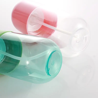 La pompe cosmétique en plastique transparente de jet met en bouteille l'emballage cosmétique de parfum de lotion de pulvérisateur de brume fine de forme de capsule de pilule