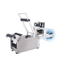 Étiqueteuse semi-automatique pour bouteilles rondes avec codage de date pour flacons et bouteilles rondes en plastique