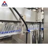 Machine de remplissage d'eau potable minérale pure entièrement automatique 5000BPH