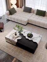 Table basse en marbre rectangulaire de luxe, design moderne et artistique, pour salon, ambiance haut de gamme