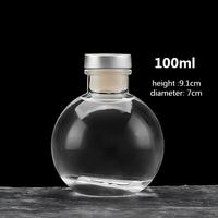 Transparante ronde glazen flesje voor wijn, likeur, brandewijn, sap, drank of fruitwijn met kurk of glazen deksel, 100ml
