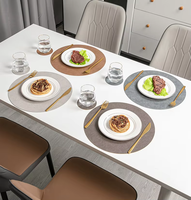 Vente en gros Nouveau style de tapis de table Nuoxin sets de table ronds double face en similicuir avec logo personnalisé