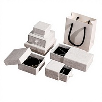 Coffret de luxe haut de gamme en papier gaufré écologique pour bijoux, cadre photo, collier, bague, boîte cadeau, sac en papier pailleté personnalisé
