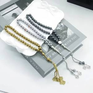 Misbaha étnica YASEEN de hematita negra metálica brillante de 8 mm, 33 cuentas, Tasbih islámico portátil para Zikr, con borla metálica. - Product Image 1