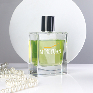 Flacon <span class=keywords><strong>de</strong></span> <span class=keywords><strong>parfum</strong></span> classique en verre transparent carré plat <span class=keywords><strong>de</strong></span> 100 ml avec bouchon noir brillant, pour les marques <span class=keywords><strong>de</strong></span> parfums <span class=keywords><strong>de</strong></span> luxe - Product Image 1