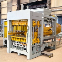 Machine de production automatique de briques en ciment QT8-15 avec système de contrôle PLC