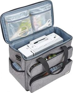 Free sample Taking the Case This multipurpose tote bag has several pockets for storing the majority of common <b>sewing</b> <b>machines</b> - Product Image 4