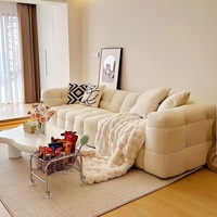 Canapé une place en tissu nordique de style français, couleur crème, en forme de guimauve, petit format, design tendance, en laine d'agneau, rembourré en éponge