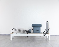 Machine d'équipement de pilates de réformateur en aluminium de lit de noyau de yoga lisse avec la grande boîte et la planche de saut