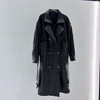 Manteau long en cuir de mouton importé pour femme, style trench, double boutonnage, avec ceinture à la taille et multiples poches, pour un look décontracté urbain