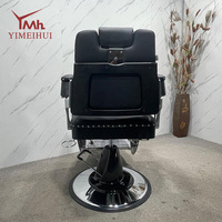 Fauteuil de barbier classique rétro avec cadre en métal, style antique intemporel pour salon de coiffure commercial