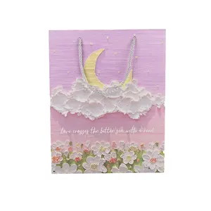 Sacchetto di carta di lusso personalizzato con logo di lusso rosa confezione regalo borse per la spesa con manici per i vestiti