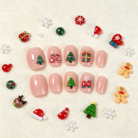 Kit de 24 compartiments de breloques de Noël mixtes pour ongles : perles décoratives en résine en forme de bonhomme en pain d'épices et clous en métal en forme de flocon de neige pour le nail art de Noël DIY