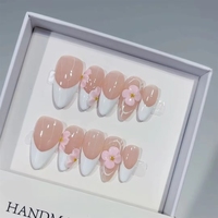 Faux ongles à presser faits main de style français, frais et clairs, multicolores, avec motifs floraux gravés effet givré, perles dorées et étamines florales