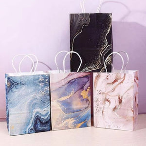 Sacs cadeaux à motifs floraux en gros, sacs en papier pour vêtements haut de gamme, sacs souvenirs de qualité supérieure, approvisionnement en usine - Product Image 1