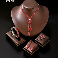Parure de bijoux haut de gamme personnalisée pour femme, créative, pour mariage, avec diamants apparents et franges, comprenant boucles d'oreilles et collier pour mariée et banquet
