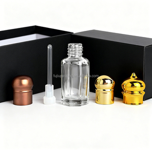 Flacon d'<span class=keywords><strong>oud</strong></span> de haute qualité 3ml 6ml 12ml <span class=keywords><strong>pas</strong></span> <span class=keywords><strong>cher</strong></span> avec applicateur à bille en verre et boîte en papier - Product Image 1