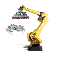 Robot industriel Fanuc M-710IC/50 à 6 axes avec pince robotique CNGBS pour la manutention et le chargement