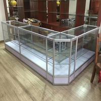 Vitrine de présentation en verre verrouillable au design unique, directement de l'usine, avec éclairage LED, couleur personnalisée, OEM/ODM pour les boutiques de tabac