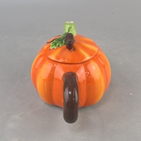 QIHE Pot en céramique moderne et classique, motif citrouille de dessin animé mignon avec feuilles, thème Halloween, avec couvercle de théière à effet de simulation, sans impression
