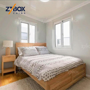 <span class=keywords><strong>Maison</strong></span> conteneur modulaire préfabriquée extensible surélevée de 40 pieds, finition <span class=keywords><strong>bois</strong></span> foncé, pour villa forestière, complexe hôtelier et glamping - Product Image 4
