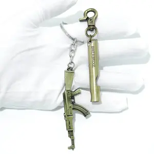 공장 빠른 배달 도매 아연 합금 청동 사용자 정의 게임 3d 금속 총 열쇠 고리 금속 총 모양 열쇠 고리
