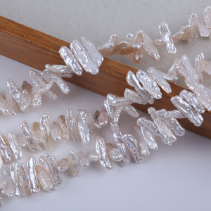 Zhuji Vente en gros Perles d'eau douce naturelles semi-finies 5-8mm, couleur blanche, trou horizontal, Pipa, pour accessoires de collier et DIY - Product Image 2