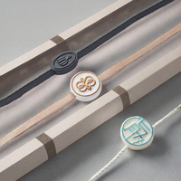 Étiquette volante personnalisée en plastique écologique avec logo OEM et cordon, scellée, pour fabricant de vêtements