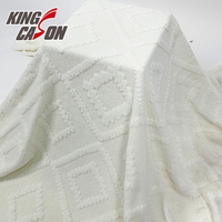 KINGCASON Chinesischer Hersteller Angenehmes Handgefühl 100 Prozent Polyester Weißer Jacquard-Sherpa-Stoff für Heimtextilien