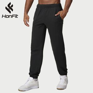 Pantalon de sport décontracté pour homme de haute qualité Pantalon de sport uni en coton et polyester avec logo personnalisé Pantalon de survêtement décontracté pour homme - Product Image 2