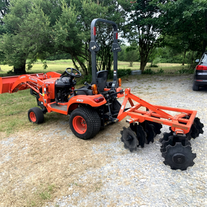 Kubota BX1880 4WD Wheel Tractor With Front Loader And Rear Tiller Attachment - Product Image 1