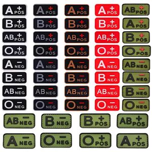 ป้ายเสื้อผ้า PVC 3 มิติ แสดงหมู่เลือด A+B+AB+O+ พร้อมแถบตีนตุ๊กแกสำหรับติดหมวก - Product Image 1