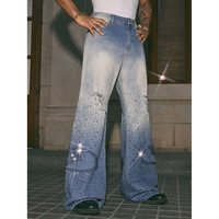Pantalon en jean délavé et vieilli à coupe ample et jambe large, taille mi-haute, avec étiquette personnalisée, strass et détails usés, vente en gros