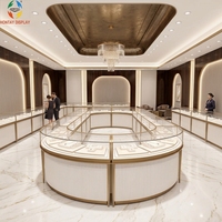 Kiosques de présentation de bijoux de luxe au design moderne et personnalisé Hontay, design incurvé, robustes, de haute qualité, en acier inoxydable doré trempé
