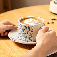 Ensemble tasse et soucoupe à café vintage peintes à la main, motif floral, glaçure bleue, tasse à latte, ensemble de thé de l'après-midi exquis, tasse et soucoupe à café en céramique