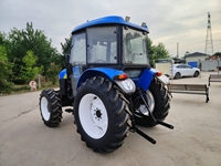 Vente directe d'usine : Tracteur agricole New Holland SNH704 4 cylindres de haute qualité (70 CV, 4 roues motrices) en excellent état.