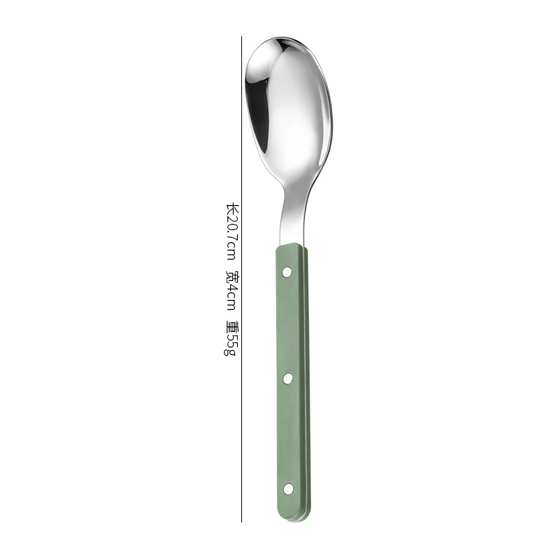 Spoon with green handle