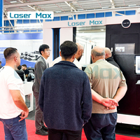 Mesin Pemotong Laser Serat Tertutup Penuh Bersertifikasi CE dengan Meja Pertukaran Otomatis 3000x1500mm untuk Bengkel