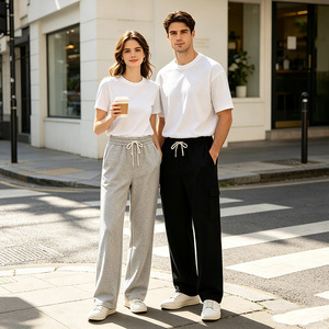 Pantalon de survêtement pour homme avec logo personnalisé, cordon de serrage, poches latérales, taille mi-haute élastique, coupe décontractée ample, jambe large, en tissu peigné - Product Image 4