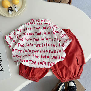 Nouvel ensemble 2 pièces pour garçon 2026 : <span class=keywords><strong>chemise</strong></span> blanche à manches courtes avec imprimé lettres et short <span class=keywords><strong>orange</strong></span> - Product Image 2