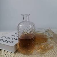 Bouteille à liqueur ovale en verre à ouverture plate avec bouchon en T