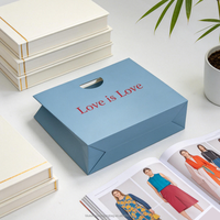 Sacs en papier d'art de luxe personnalisés OEM/ODM avec poignée découpée, en matériaux recyclés, pour le shopping, la vente en gros de vêtements et de bijoux